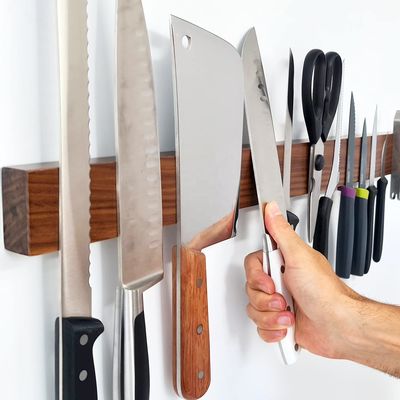 Pratico utensile da cucina porta coltello magnetico a noce con funzionalità multiuso